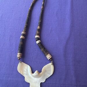 Hand carved mother of pearl eagle necklace